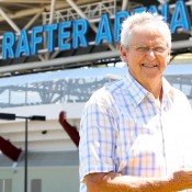 Roy Emerson with the Brisbane International men's trophy named in his honour. Tennis Australia.