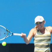 Anastasia Rodionova of Australia plays a forehand in her first round match against Naiktha Bains of Australia during the 2015 Australian Open play off at Melbourne Park on December 16, 2014 in Melbourne, Australia.  (Photo by Robert Prezioso/Getty Images)