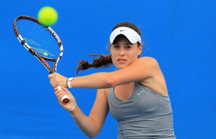 Kimberly Birrell plays a backhand. Kimberly Birrell plays a backhand.