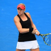 Jessica Moore plays a backhand during qualifying for 2015 Australian Open at Melbourne Park on January 15, 2015 in Melbourne, Australia.