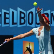 Monique Adamczak of Australia serves during her matach against Dinah Pfizenmaier of Germany during Australian Open qualifying at Melbourne Park on January 10, 2013 in Melbourne, Australia; Getty Images