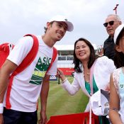 Alex de Minaur of Australia poses for a photo with fans at The Queen's Club in London, England. [Photo: Annabel Lee-Ellis/Getty Images]