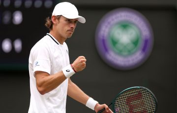 Alex de Minaur in action en route to the 2024 Wimbledon quarterfinals. [Getty Images]