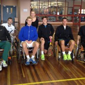 Nick Kyrgios (far left), Luke Saville (third from left), Andrew Harris (kneeling) and Alex Bolt (second from right) with staff during their visit to the Royal Talbot Rehabilitation Centre; Tennis Australia