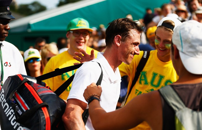 Aussies at Wimbledon week 1 Qualifier John Millman is congratulated by Aussie fans after pushing Marcos Baghdatis to five sets in the second round; Getty Images