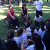 Sarah Calati (R) and Luba Josevski talk to school students in Argentina; Tennis Australia