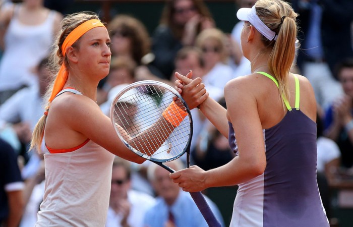 Azarenka Sharapova Maria Sharapova (R) shakes hands at the net with Victoria Azarenka after winning their 2013 French Open semifinal at Roland Garros; Getty Images