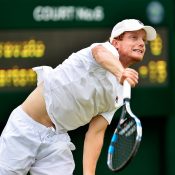 Matt Barton serves during his straight-sets second-round Wimbledon qualifying win over Marcelo Arevalo; Getty Images