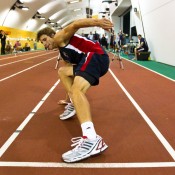 Ben Mitchell stretches during an agility test at the AIS. Tennis Australia.