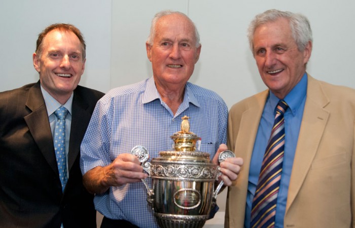 Author Richard Naughton, Wimbledon champion Neale Fraser and Sir Norman Brookes's grandson Norman Gengoult-Smith with Brookes' Wimbledon trophy. MAE DUMRIGUE Author Richard Naughton, Wimbledon champion Neale Fraser and Sir Norman Brookes's grandson Norman Gengoult-Smith with Brookes' Wimbledon trophy. MAE DUMRIGUE