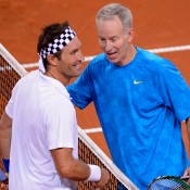 Pat Cash (L) and John McEnroe; Getty Images