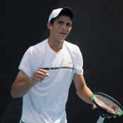 Alexander Crnokrak celebrates his victory over Benard Nkomba in the final of the 18/u Australian Championships at Melbourne Park; Elizabeth Xue Bai