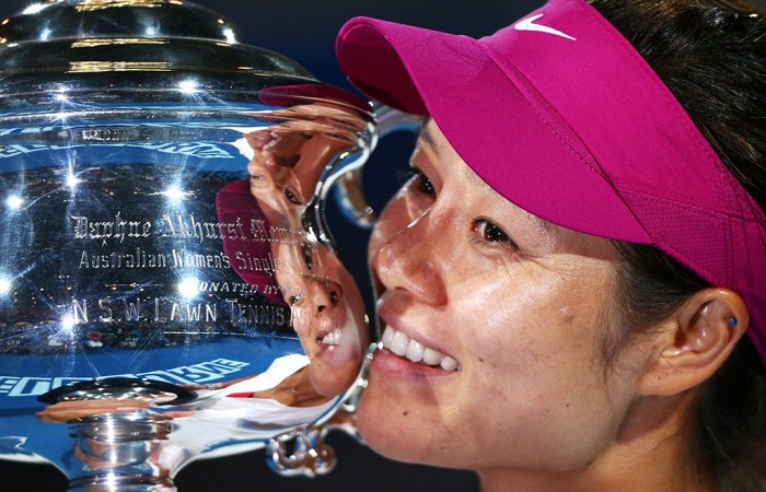 Na Li of China holds the Daphne Akhurst Memorial Cup after winning the women's final. MELBOURNE, AUSTRALIA - JANUARY 25: Na Li of China holds the Daphne Akhurst Memorial Cup after winning the women's final match against Dominika Cibulkova of Slovakia during day 13 of the 2014 Australian Open at Melbourne Park on January 25, 2014 in Melbourne, Australia. (Photo by Graham Denholm/Getty Images)