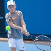 Dane Sweeny in action during the Australian 12-and-under Championships; Matt Johnson