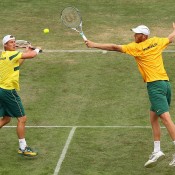 Lleyton Hewitt (L) and Chris Guccione in Davis Cup doubles action; Getty Images