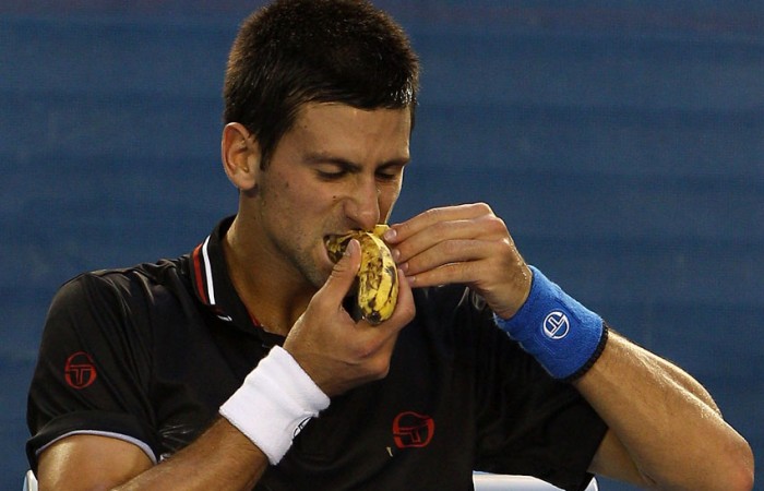 Novak Djokovic Novak Djokovic eats a banana during Australian Open 2012; Getty Images