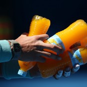 Rafael Nadal of Spain holds drink bottles in his quarterfinal match. MELBOURNE, AUSTRALIA - JANUARY 22: Rafael Nadal of Spain holds drink bottles in his quarterfinal match against Grigor Dimitrov of Bulgaria during day 10 of the 2014 Australian Open at Melbourne Park on January 22, 2014 in Melbourne, Australia. (Photo by Clive Brunskill/Getty Images)