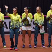 Australia's Fed Cup team of (L-R) Sam Stosur, Casey Dellacqua, Jarmila Gajdosova, Olivia Rogowska and captain Alicia Molik on court for the opening ceremony of the Netherlands v Australia Fed Cup World Group Play-off tie in 's-Hertogenbosch; Henk Koster