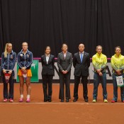 The Dutch and Australian teams on court ahead of the Netherlands v Australia Fed Cup World Group Play-off tie in 's-Hertogenbosch; Henk Koster