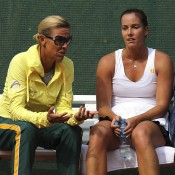 Jarmila Gajdosova (R) of Australia speaks to Fed Cup coach Nicole Bradtke during her match against Romina Oprandi; Getty Images
