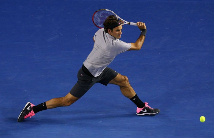 Roger Federer Roger Federer of Switzerland plays a backhand in his quarterfinal against Jo-Wilfred Tsonga of France on Day 10 at Australian Open 2013 at Melbourne Park; Getty Images