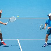 Andrew Florent (left) played with Josh Eagle during the Australian Open 2014 legends event; Getty Images