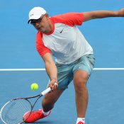 Andrew Florent in action during the Australian Open 2014 legends event; Getty Images
