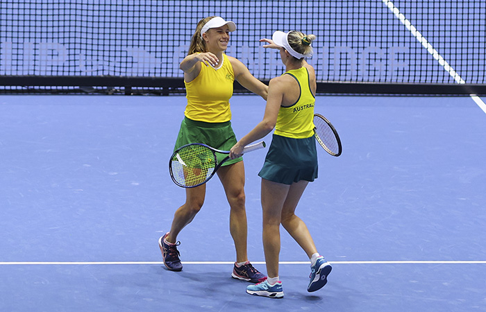 SEVILLE, SPAIN - NOVEMBER 09: Storm Hunter and Ellen Perez of Team Australia celebrates after winning the Billie Jean King Cup Finals group stage doubles match between Australia and Kazakhstan at Estadio de La Cartuja on November 09, 2023 in Seville, Spain. (Photo by Fran Santiago/Getty Images for ITF)