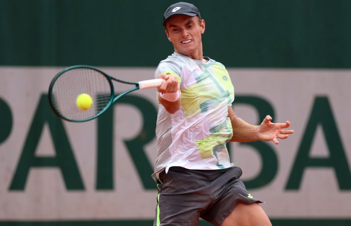 PARIS, FRANCE - MAY 25: Tristan Schoolkate of Australia plays a forehand against Marton Fucsovics of Hungary in the Men's Singles First Round match on Day One of the 2025 French Open at Roland Garros on May 25, 2025 in Paris, France. (Photo by Julian Finney/Getty Images)