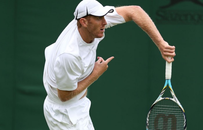 Chris Guccione serving Chris Guccione during his doubles first round match with Samuel Groth at the 2013 Wimbledon Championships in London, England; Getty Images