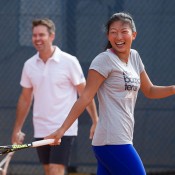Jeanette Lin (R) and Todd Woodbridge; Elizabeth Xue Bai