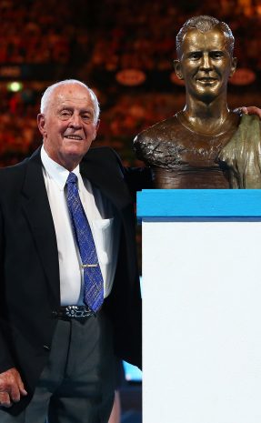 Rex Hartwig poses with his bronze bust as he is inducted into the Australian Tennis Hall of Fame at Rod Laver Arena during Australian Open 2016 at Melbourne Park; Getty Images
