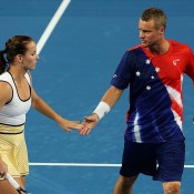 Jarmila Wolfe (L) and Lleyton Hewitt in action for Australia Gold against Czech Republic at the Hopman Cup; Getty Images