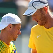 Lleyton Hewitt (L) and Chris Guccione in Davis Cup doubles action in the World Group Play-off tie against Uzbekistan in September 2014 in Cottesloe; Getty Images 