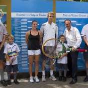 Sally Peers (third from left), Michael Look (centre) and Ipswich Mayor Paul Pisasale with school students and MLC Tennis Hot Shots participants at the City of Ipswich Tennis International draw ceremony; Tennis Australia