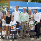 Sally Peers (second from left), Michael Look (fourth from left) and Ipswich Mayor Paul Pisasale (second from right) with representatives from Metro Hotel, school students and MLC Tennis Hot Shots participants at the City of Ipswich Tennis International draw ceremony; Tennis Australia