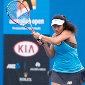 Jeanette Lin in action during her first round win at the 14/u Australian Championships at Melbourne Park; Elizabeth Xue Bai
