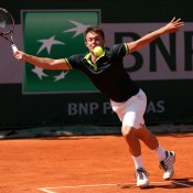 Jay Andrijic of Australia reaches for a forehand during his boys' singles first round match against Hyeon Chung of Republic of Korea on Day 8 of the French Open at Roland Garros in Paris, France; Getty Images