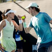Kimberly Birrell (L) and John-Patrick Smith in mixed doubles action at Australian Open 2025. [Getty Images