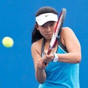 Jeanette Lin in action during the 2014 14/u Australian Championships at Melbourne Park; Elizabeth Xue Bai