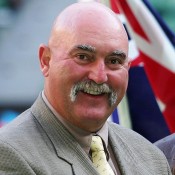 Mark Edmondson is inducted into the Australian Tennis Hall of Fame on Rod Laver Arena in 2007. (Photo by Mark Dadswell/Getty Images)