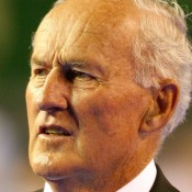 Neale Fraser of Australia at a ceremony for Guilermo Vilas before the third rubber of the Davis Cup final at Estadia Islas Malinas in Mar del Plata, Argentina; Getty Images