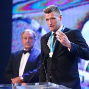 Newcombe Medal winner Sam Groth speaks as John Newcombe looks on; Getty Images