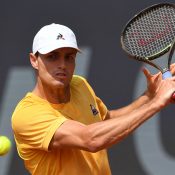 Australia's Christopher O'Connell returns the ball to Italy's Flavio Cobolli (unseen) during their quarter final match at the ATP tennis BMW Open in Munich, southern Germany, on April 21, 2023. (Photo by Christof STACHE / AFP) (Photo by CHRISTOF STACHE/AFP via Getty Images)