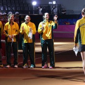 The Australian team in good spirits as Sam Stosur is introduced to the court prior to their Fed Cup tie against Germany; Tennis Australia