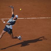 Patrick Rafter of Australia makes an off the ground overhead shot return against Sergi Bruguera during the Men's Singles semi final match during the French Open Tennis Championship on 6th June 1997 at the Stade Roland Garros Stadium in Paris, France. (Photo by Gary M. Prior/Getty Images)