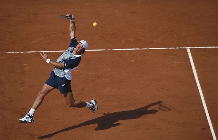 Patrick Rafter of Australia makes an off the ground overhead shot return against Sergi Bruguera during the Men's Singles semi final match during the French Open Tennis Championship on 6th June 1997 at the Stade Roland Garros Stadium in Paris, France. (Photo by Gary M. Prior/Getty Images)
