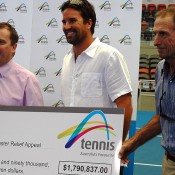 The tennis community donates to the Premier's Relief Appeal (l to r:) Queensland Minister for Sport Phil Reeves, Pat Rafter and Ashley Cooper. Photo: Tennis Queensland