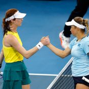 Yulia Putintseva (R) shakes hands with Maya Joint after winning the first singles rubber in the Australia v Kazakhstan Billie Jean King Cup Qualifiers tie at Pat Rafter Arena, Brisbane. (Photo: Josh Woning)
