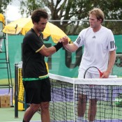 Brydan Klein (right) and Nick Lindahl shake hands after their first round match. Photo: Rob Hamilton